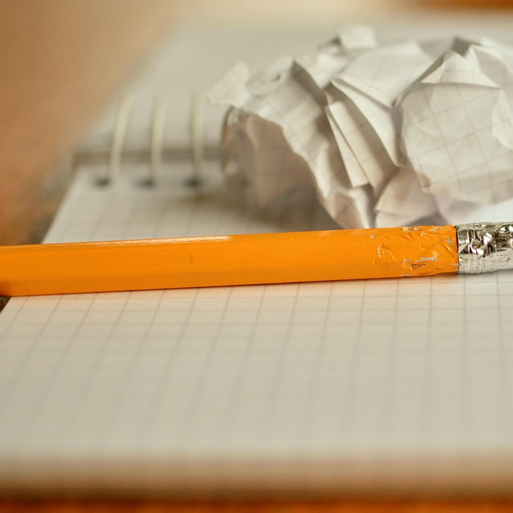 woman writing notebook minimal